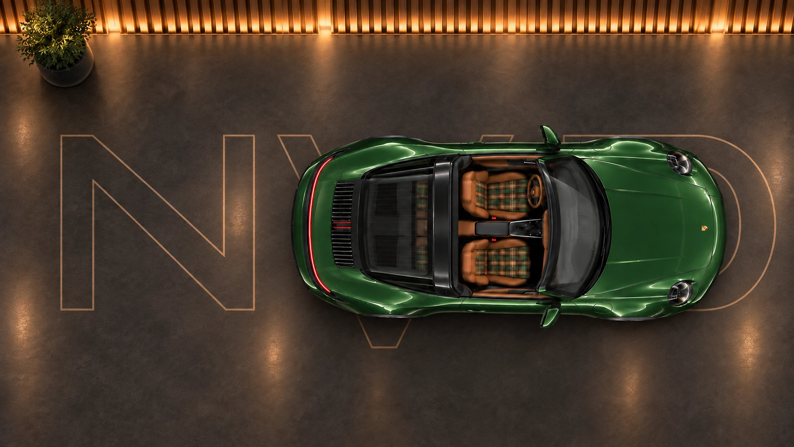 Groene Porsche 911 Targa van bovenaf op het NVD-logo in de showroom